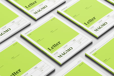 Free US Letter Editorial Magazine Mockup On Surface Angled View