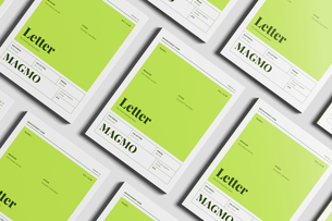 Free US Letter Publishing Magazine Mockup On Surface Angled View