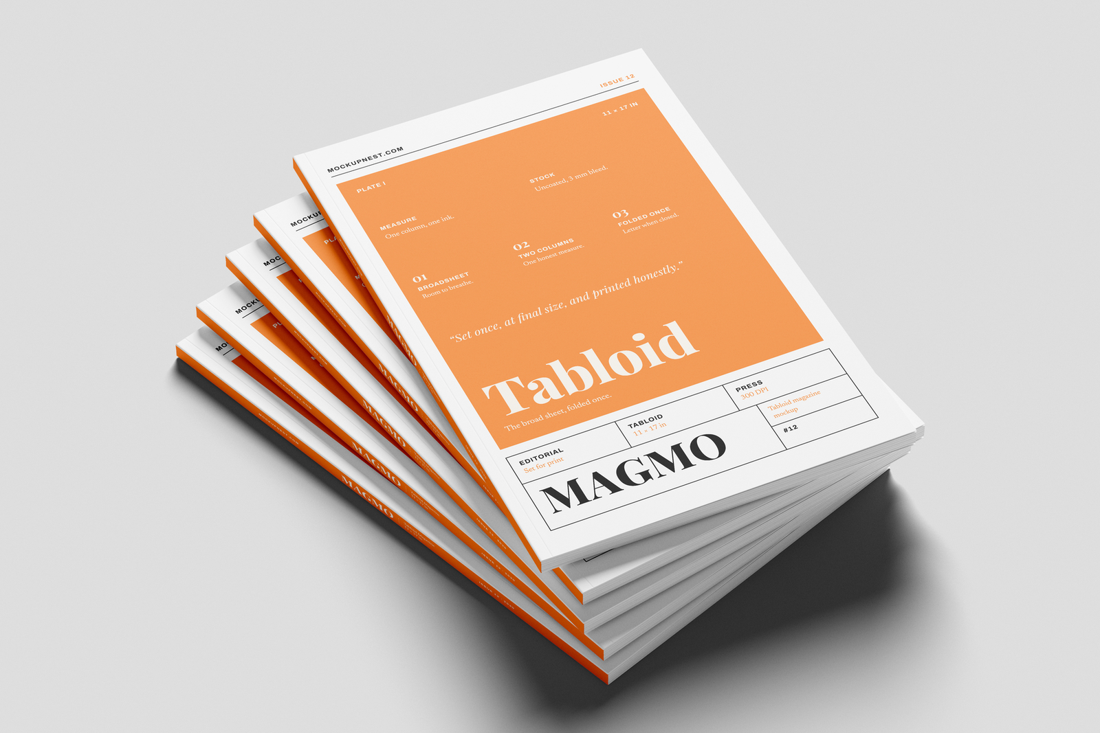 Free 11×17 Magazine Mockup On Surface