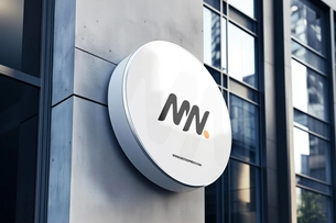 Free Round Signboard Mockup On Building Wall