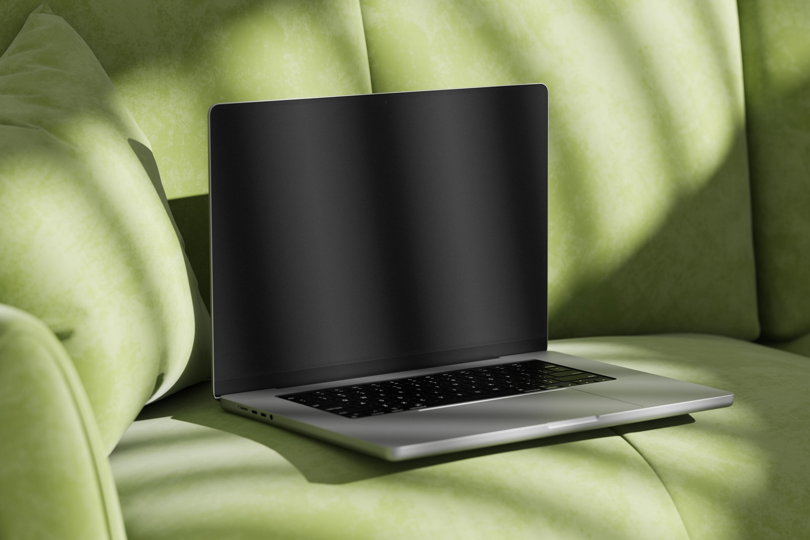 Free Macbook Pro Mockup On Sofa