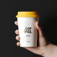 Free Paper Coffee Cup Mockup Holding By Hand