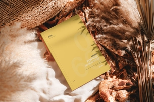 Free Softcover Book Mockup with Rustic Decor and Shadows