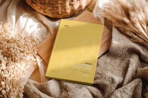 Free Hardcover Book Mockup on Lifestyle Background
