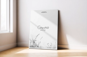 Free Canvas Mockup Leaning Against Wall with Soft Sunlight