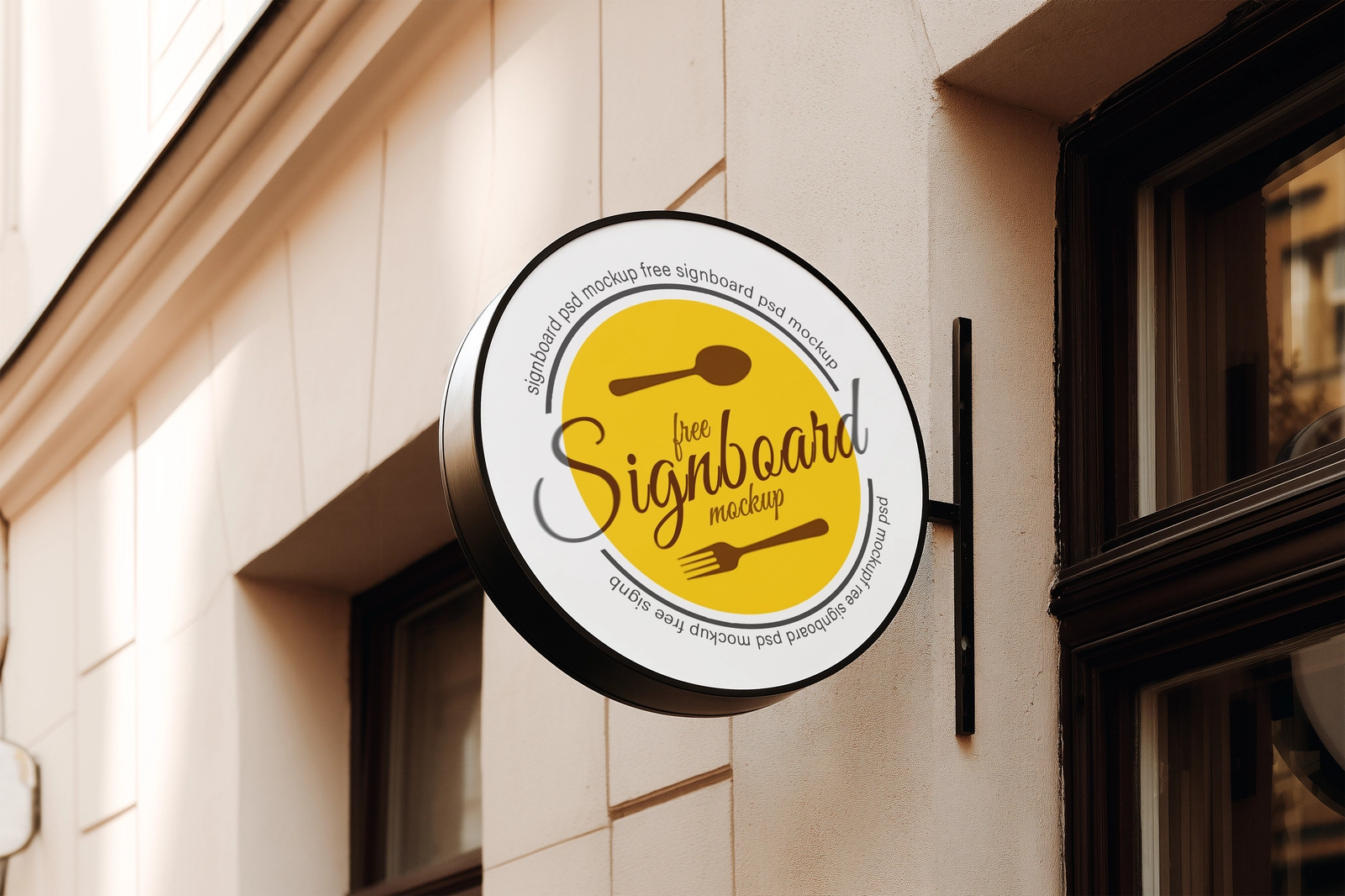 Free Round Cafe Sign Mockup on European Coffee Shop Facade