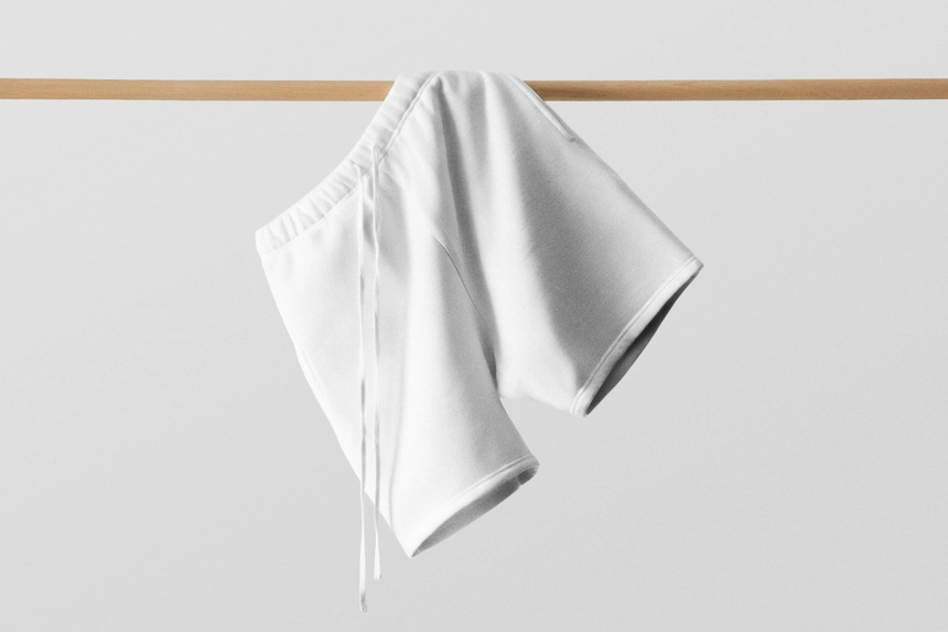 Short Pants Mockup Hanging on Wooden Rod