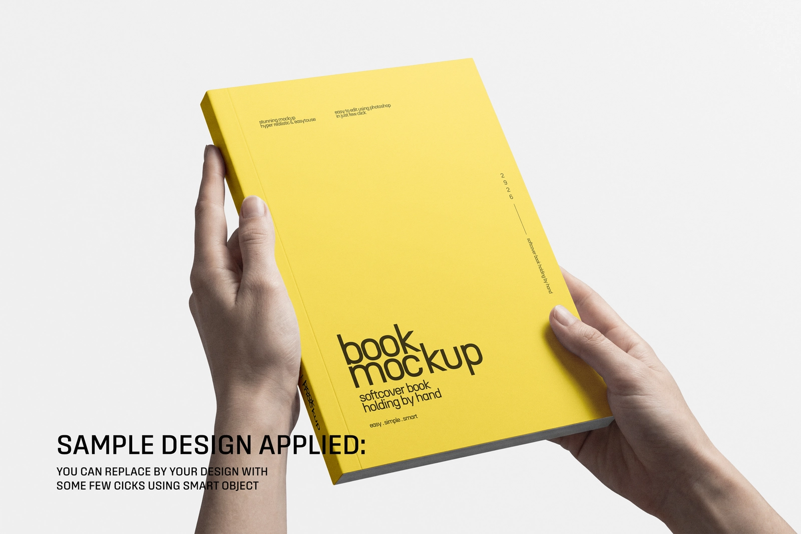 Softcover Portrait Book Holding By Hand Mockup
