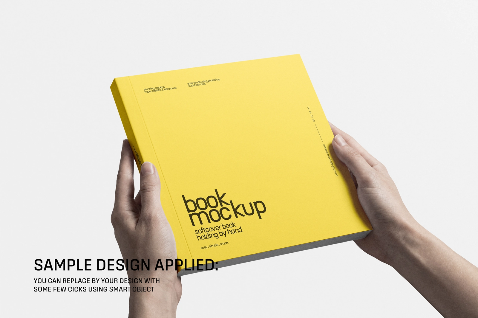 Square Softcover Book Holding By Hand Mockup