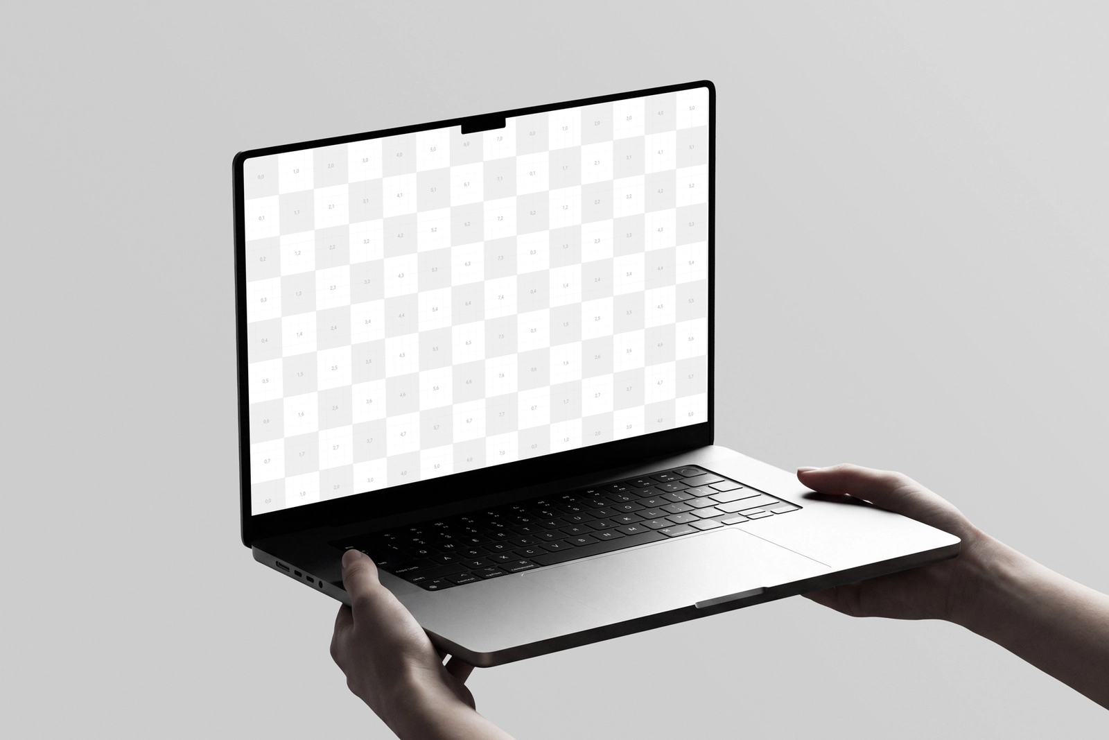 Free Macbook Pro Holding By Hand Mockup