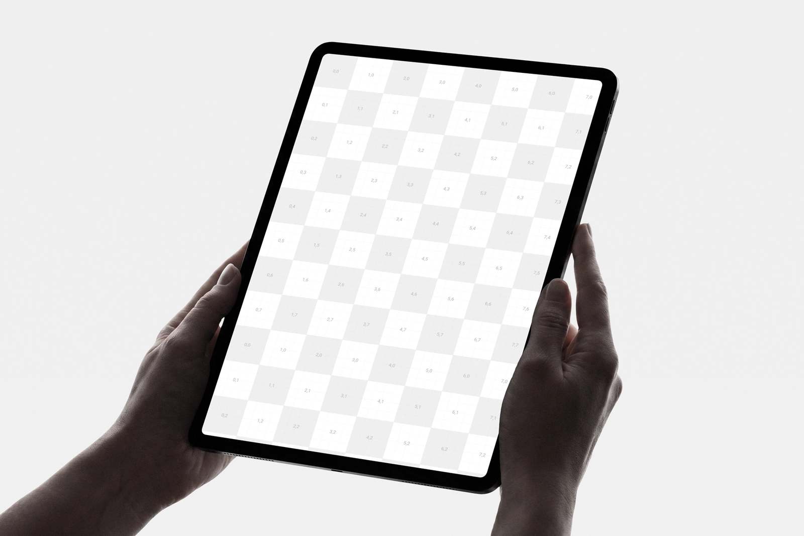 iPad Pro in Hand Mockup with Tilted Perspective View