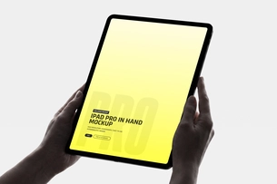 iPad Pro in Hand Mockup with Tilted Perspective View