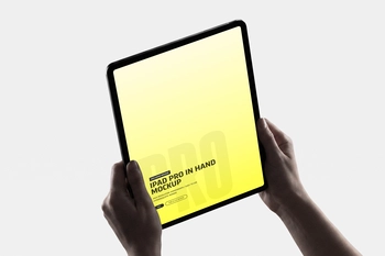 iPad Pro Portrait Mockup Held with Soft Studio Lighting