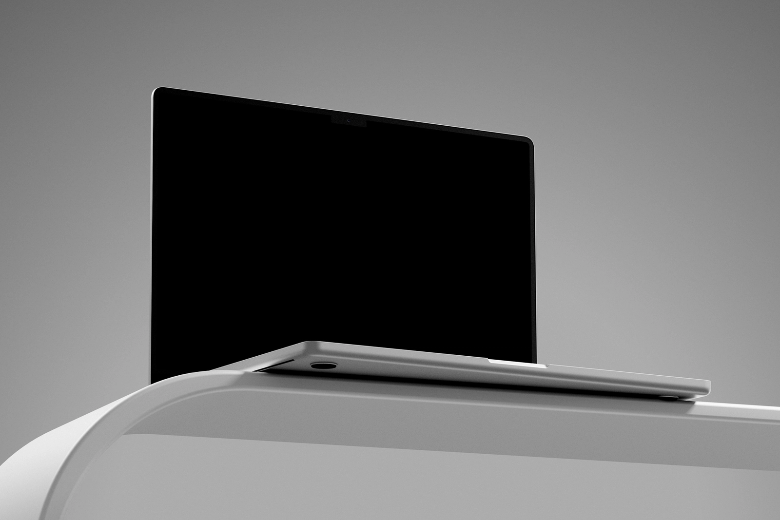 Free MacBook Pro Mockup Low Perspective