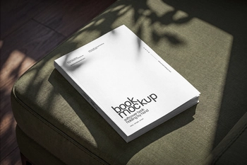 Free Softcover Book Mockup On Sofa