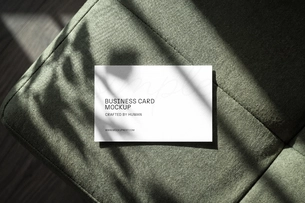 Free Business Card Mockup On Sofa From Top